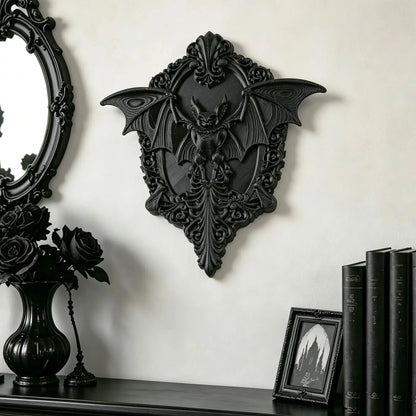 Bat wall plaque hung above a gothic doorway