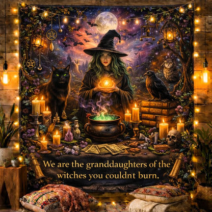 Gothic witch tapestry with black cat, raven, glowing cauldron, and "granddaughters of witches" text.