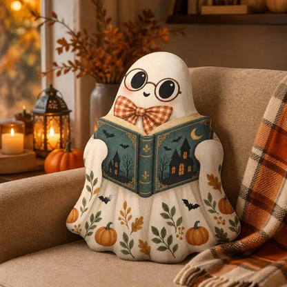 Styled room view: decorative plush pillow featuring reading ghost illustration