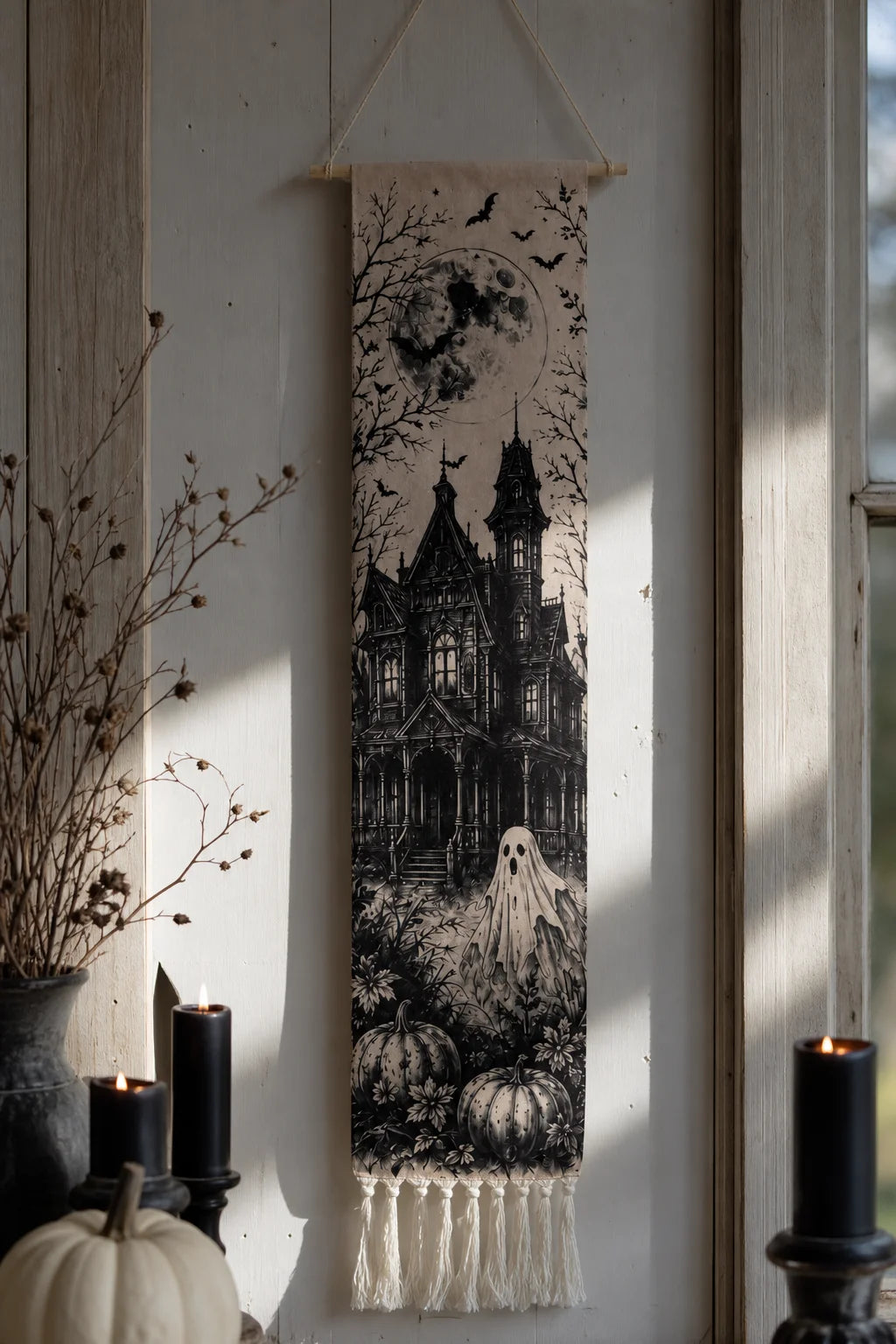 Halloween haunted house tapestry hanging with black candles and white pumpkin