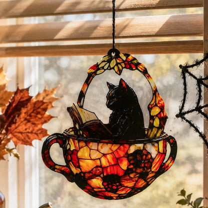 Halloween black cat teacup suncatcher near window blinds with autumn leaf decor