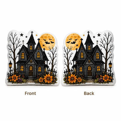 Front and back views: haunted house moon plush pillow with haunted house, bats and full moon artwork