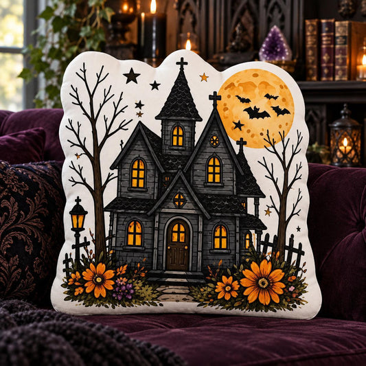 Haunted House Moon Pillow in a sunlit witchy room