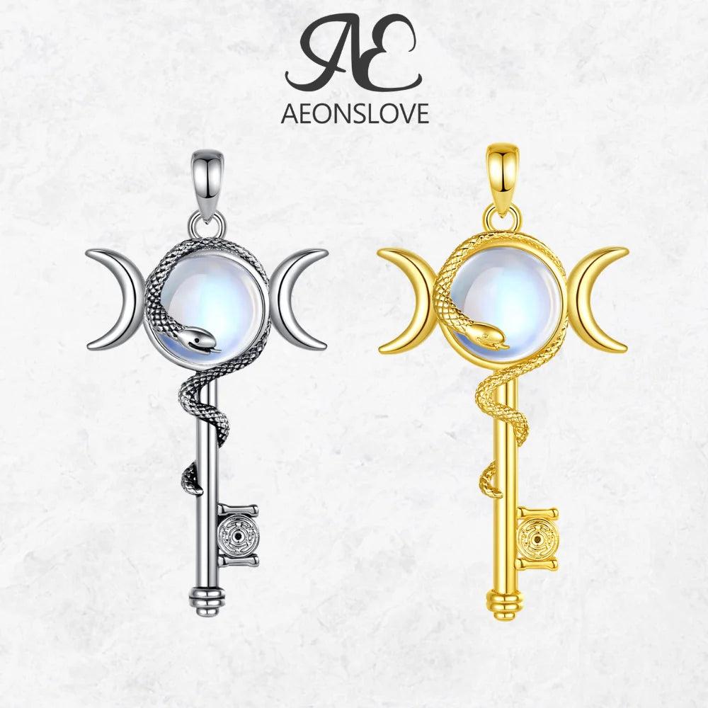 Silver and gold Hecate Triple Moon key necklaces with moonstone and snake design.