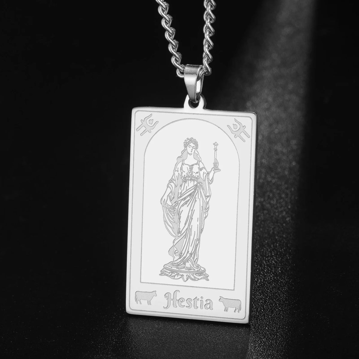 Hestia hearth goddess necklace presented in a gift box