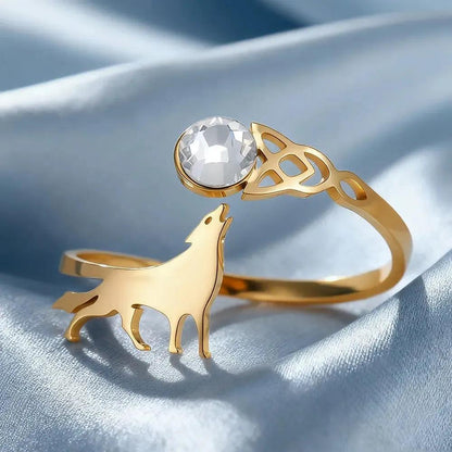 Gold stainless steel adjustable ring with howling wolf, clear zircon, and Celtic knot.