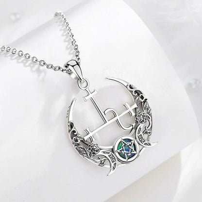 Stunning sterling silver Triple Moon Goddess necklace with an iridescent opal pentagram and intricate floral details.
