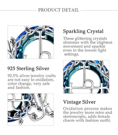 Close-up of a sparkling crystal 925 sterling silver Lilith Moon pendant with vintage silver details.