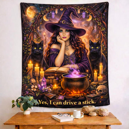 Magical witch tapestry with a purple-robed witch, two black cats, a cauldron, candles, and moon phases.