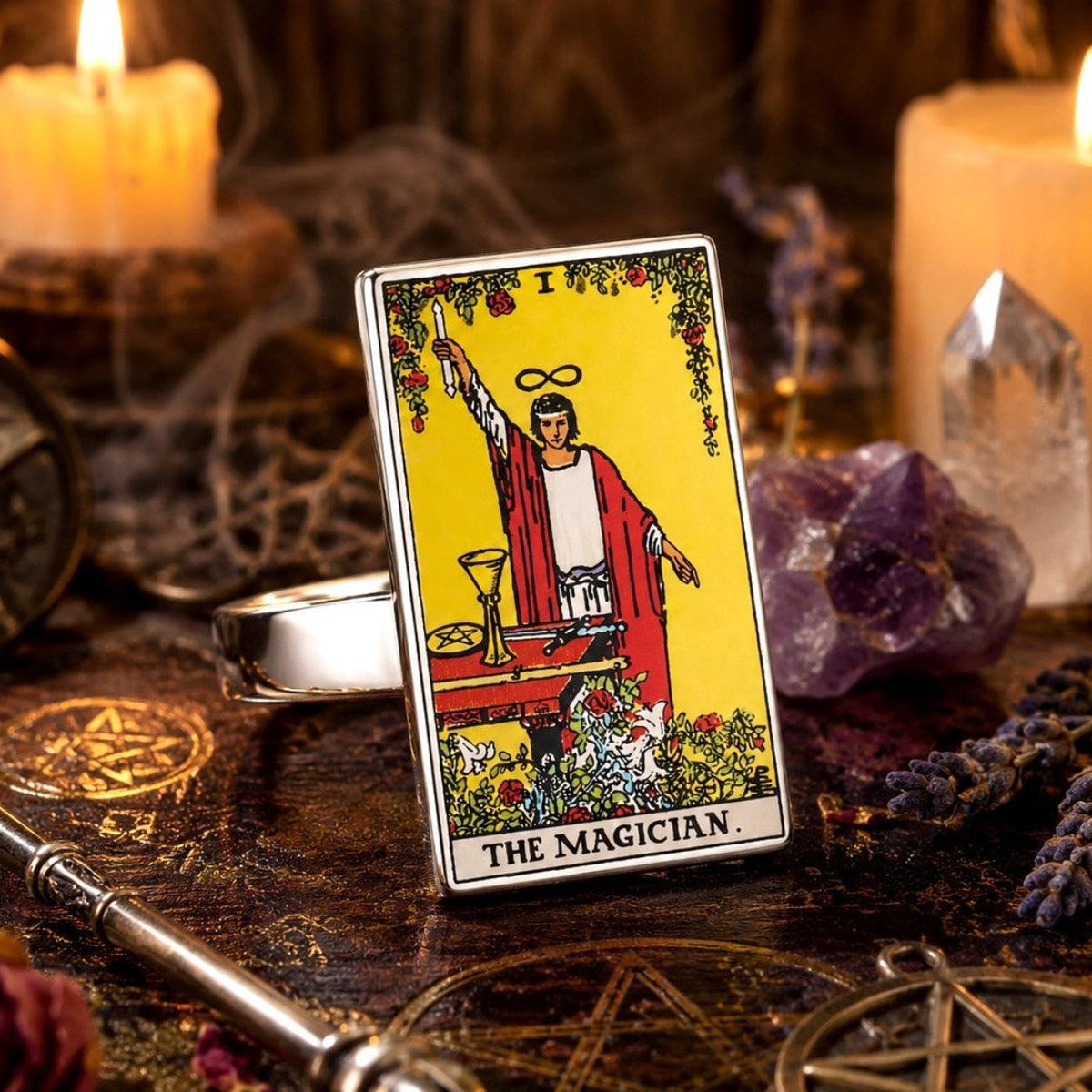 The Magician tarot card ring in stainless steel with candles, quartz and a wand on a pentacle altar