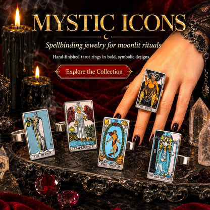 Mystic Icons tarot ring collection: hand wearing Major Arcana rings on red velvet with crystals and candles