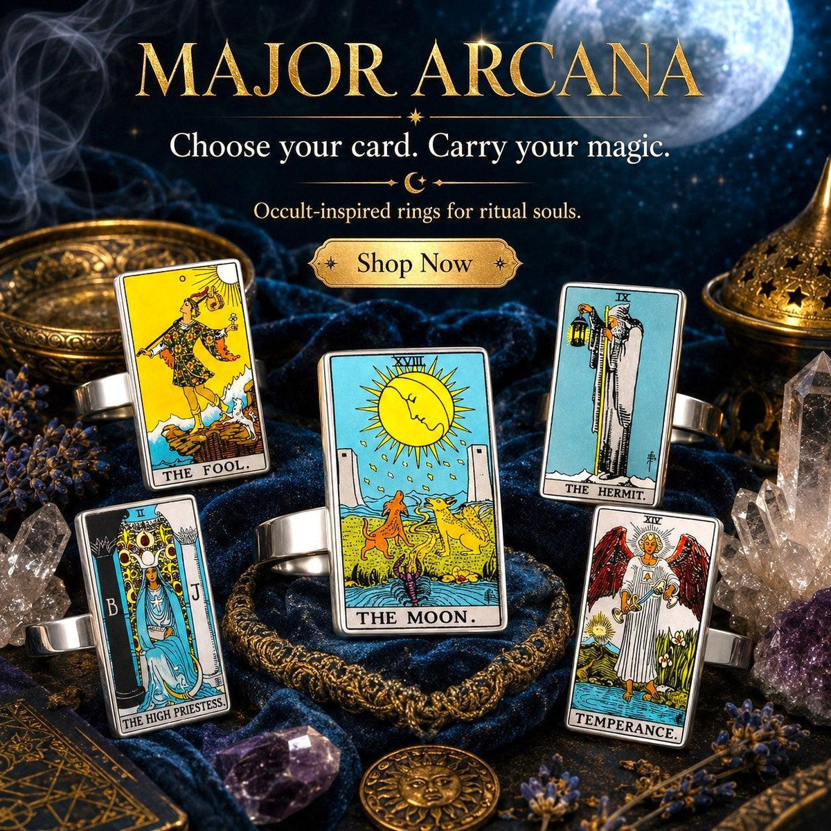 Major Arcana tarot card rings on blue velvet with The Fool, The Moon and The Hermit designs under a full moon