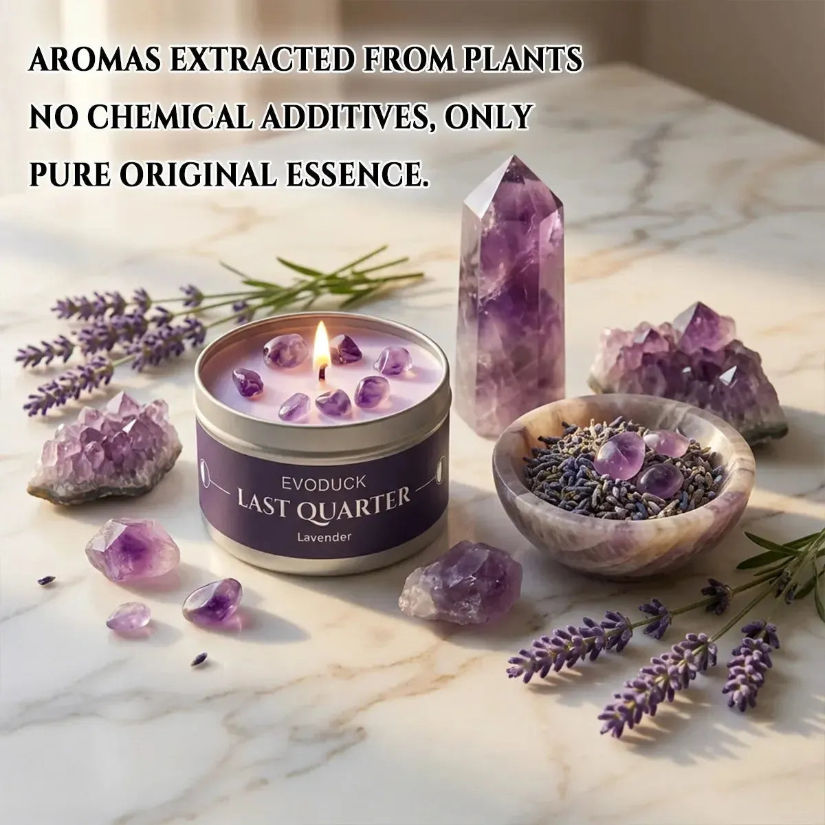 Last Quarter Candle lit on marble surface with lavender sprigs, amethyst crystals and a bowl of dried lavender buds - natural pure essence, no chemical additives