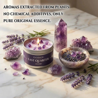 Last Quarter Candle lit on marble surface with lavender sprigs, amethyst crystals and a bowl of dried lavender buds - natural pure essence, no chemical additives