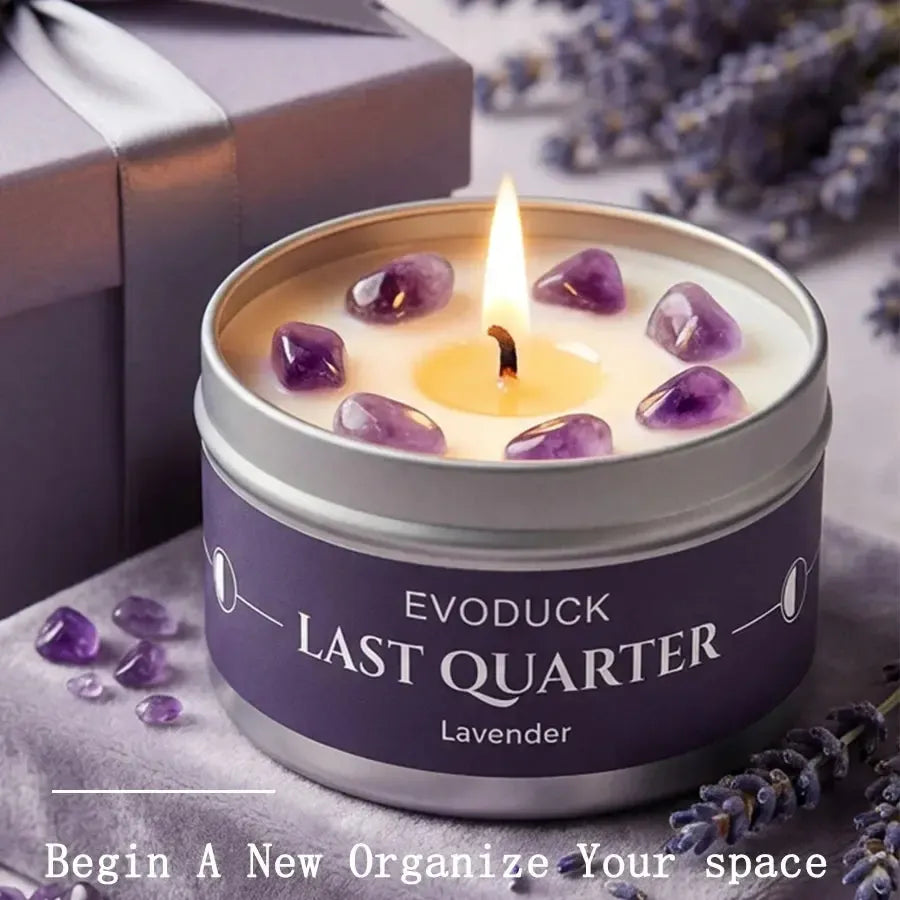 Last Quarter Candle in purple tin with Lavender scent, amethyst crystals in soy wax beside a wrapped gift box and lavender sprigs, Moon Phase Candle Wicca ritual gift