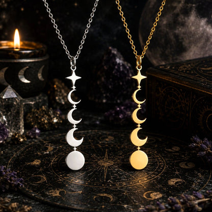 Two celestial moon phase necklaces displayed side by side. One necklace features a silver-toned chain with a vertical stack of silver crescent moons, a star, and a round disc pendant.