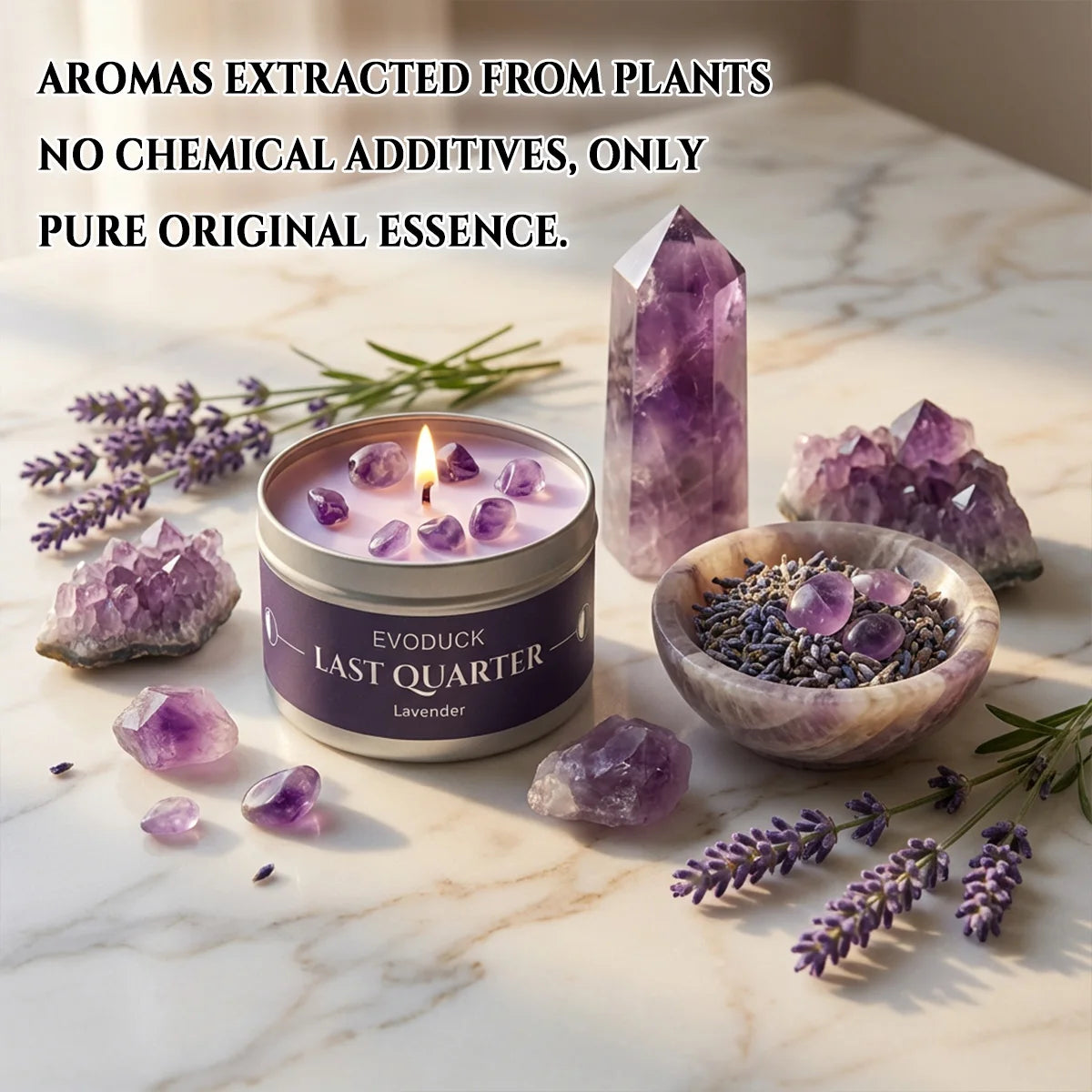 Last Quarter Candle lit on marble surface with lavender sprigs, amethyst crystals and a bowl of dried lavender buds - natural pure essence, no chemical additives