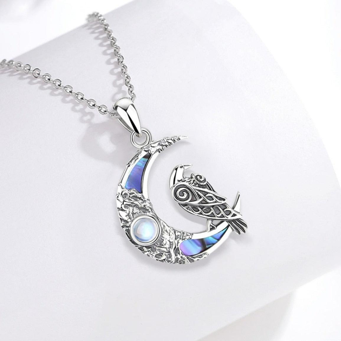 Exquisite 925 sterling silver Moonstone Raven Moon Necklace, 19x31mm, with iridescent abalone inlay.