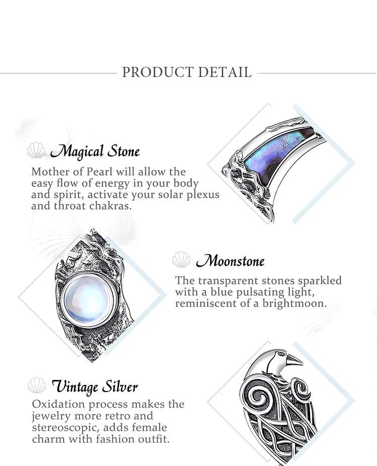Sterling silver Moonstone Raven Moon Necklace with a blue pulsating stone, 19mm x 31mm pendant.