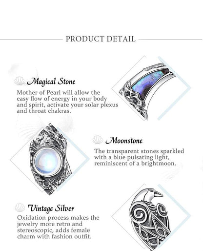Sterling silver Moonstone Raven Moon Necklace with a blue pulsating stone, 19mm x 31mm pendant.