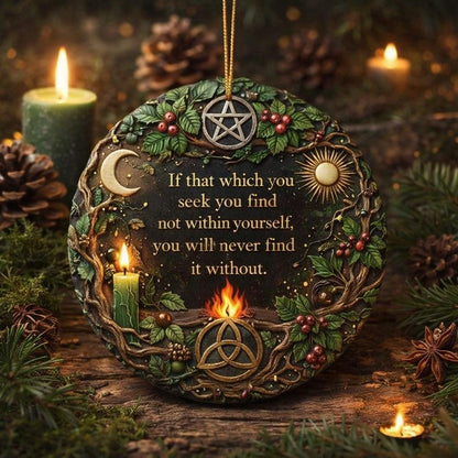 Round ceramic Yule ornament with green leaves, red berries, a pentacle, triple moon, sun, Celtic knot, and candles.