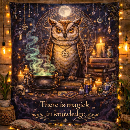 Mystical owl tapestry with glowing eyes, pentagram, spell books, cauldron, and "There is magick in knowledge" text.