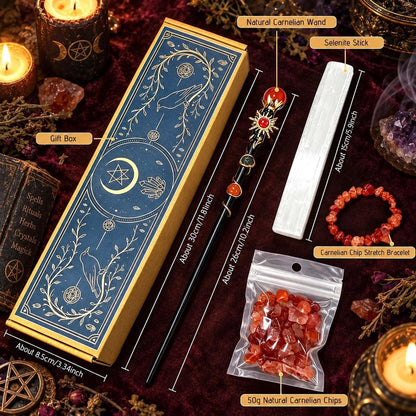 A styled flat-lay of a Wiccan altar set featuring a dark blue and gold gift box, a black wand, a white salient stick, a red gemstone charm, a red carnelian bracelet, and a bag of red carnelian chips, all labeled with text overlays on a dark red velvet background with candles and crystals.