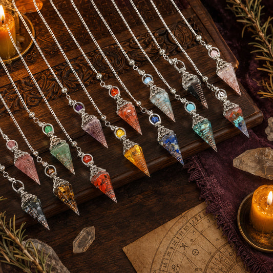 Natural stone latticed pendulum variant collection in a warm Wiccan ritual scene
