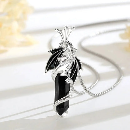 Gothic obsidian necklace shown flat with its steel chain