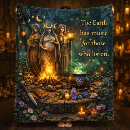 Pagan Triple Goddess fleece blanket with mystical elements, campfire, cauldron, crystals, and "The Earth has music" quote.