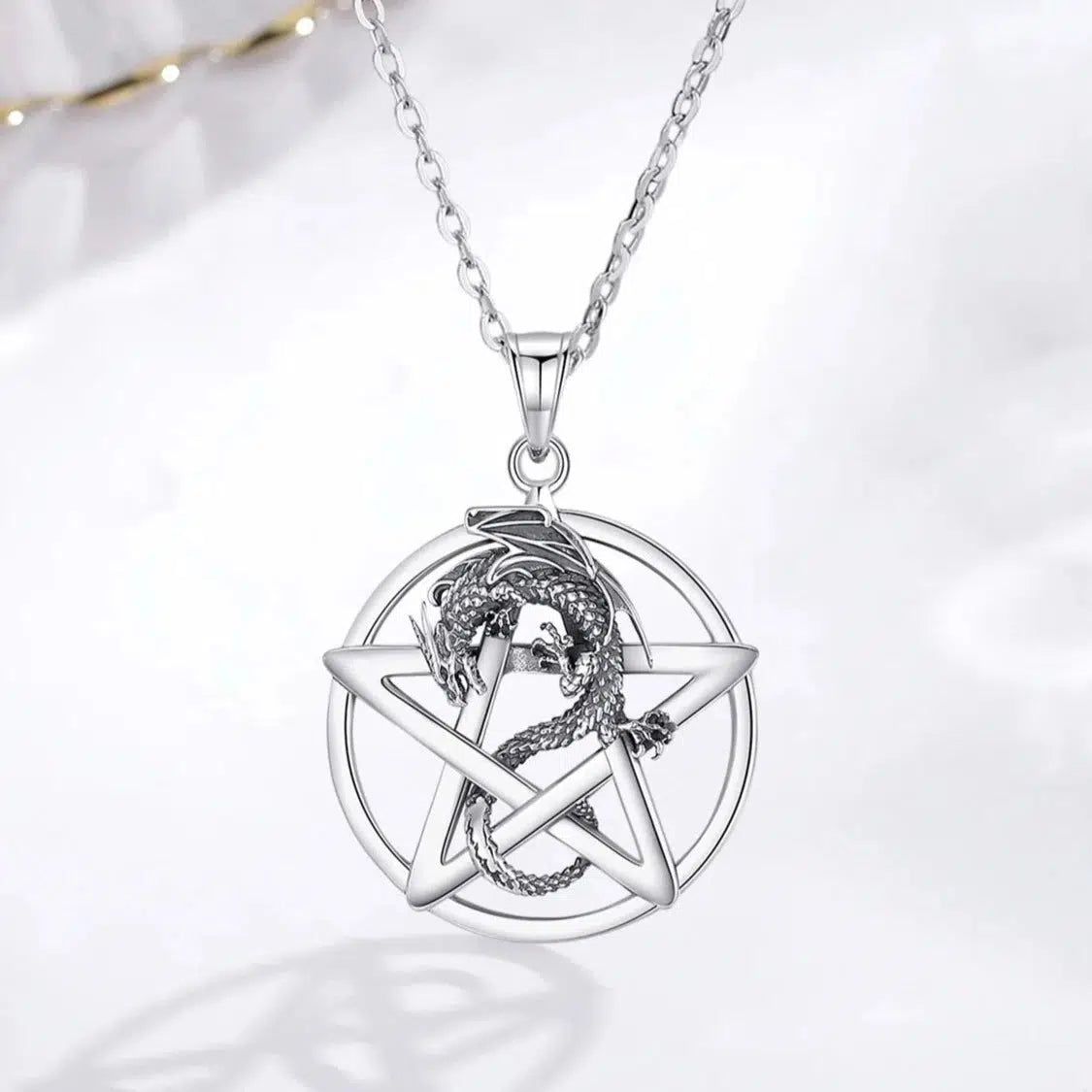 Striking 925 sterling silver Pentacle Dragon Necklace, featuring a fierce dragon wrapped around a sacred pentacle.