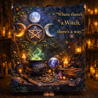 Dark fleece blanket with a triple moon, pentagram, cauldron, crystal ball, and "Where there's a Witch, there's a way" text.