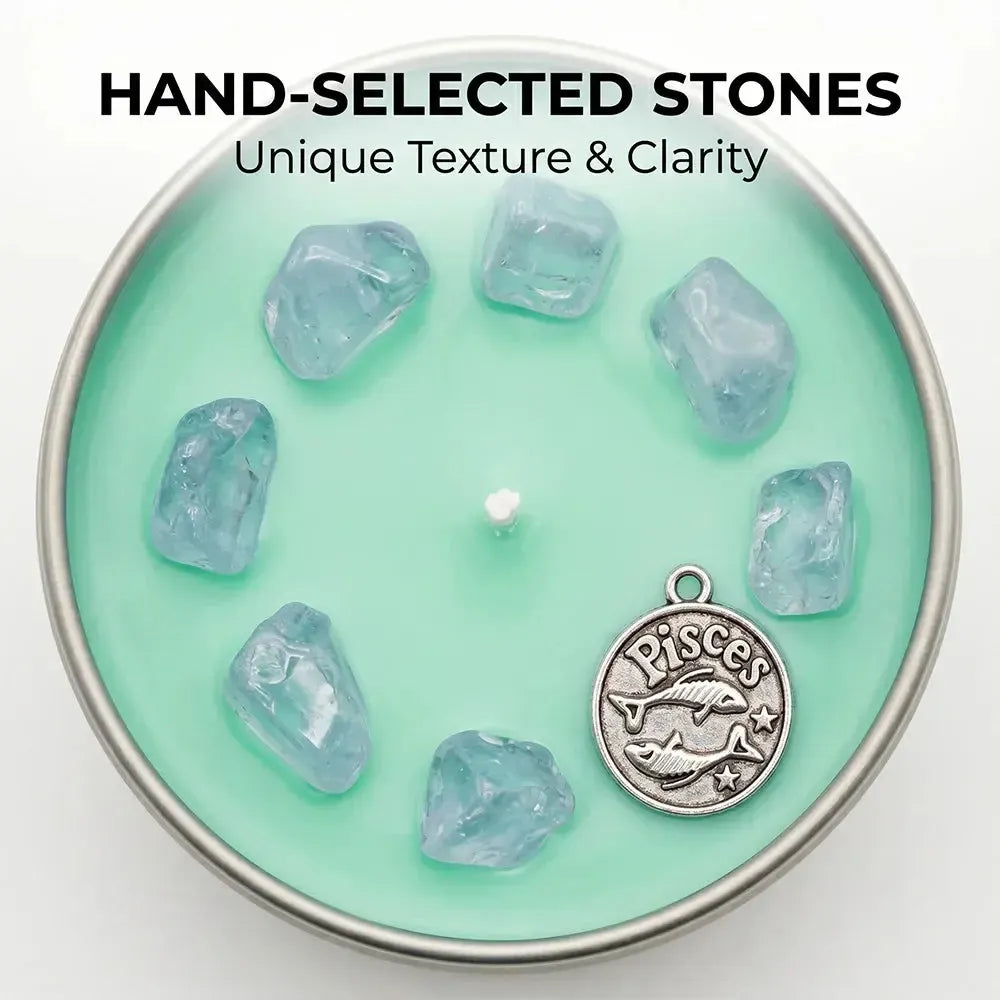 Close-up of Pisces Candle teal wax with aquamarine crystal chunks and a Pisces fish charm - Hand-Selected Stones, Unique Texture and Clarity