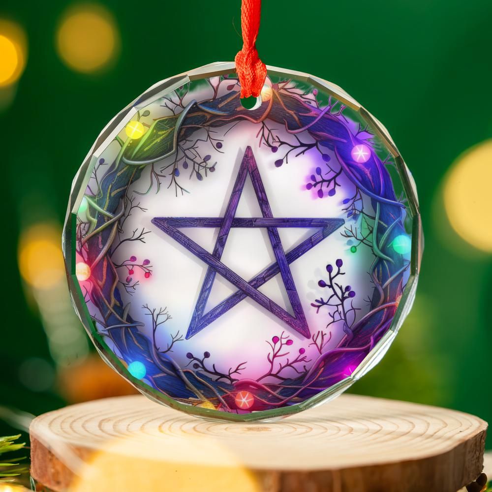 Clear glass pentagram ornament with purple star, surrounded by colorful glowing branches, hanging by a red ribbon.