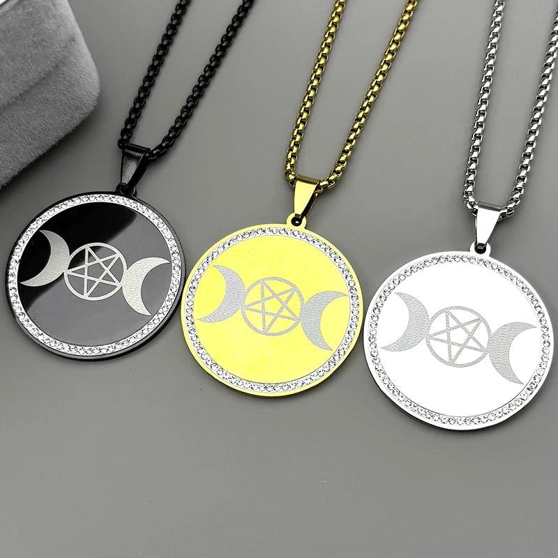 Three triple moon pentagram necklaces in black, gold, and silver, with rhinestone-studded circular pendants.