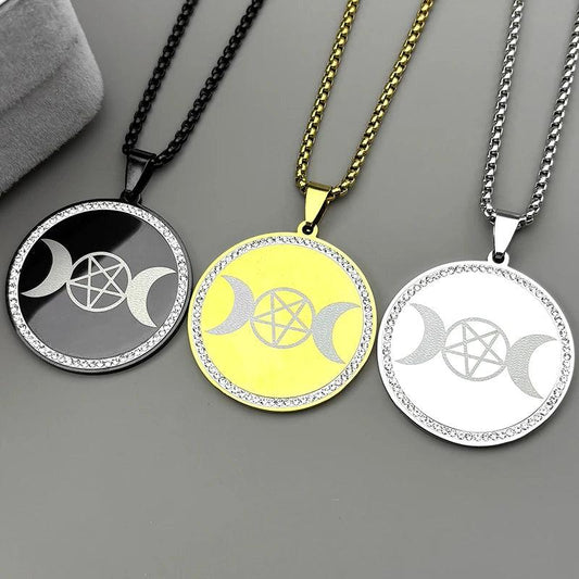 Three triple moon pentagram necklaces in black, gold, and silver, with rhinestone-studded circular pendants.