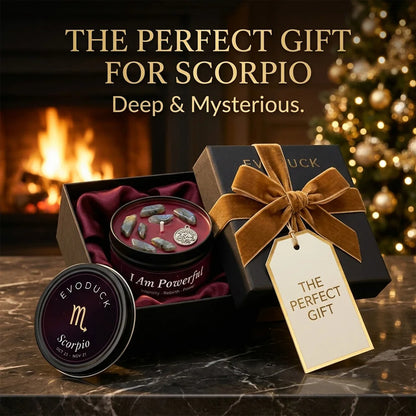 Scorpio Candle gift box with gold velvet ribbon and gift tag by a fireplace - The Perfect Gift for Scorpio, Deep and Mysterious