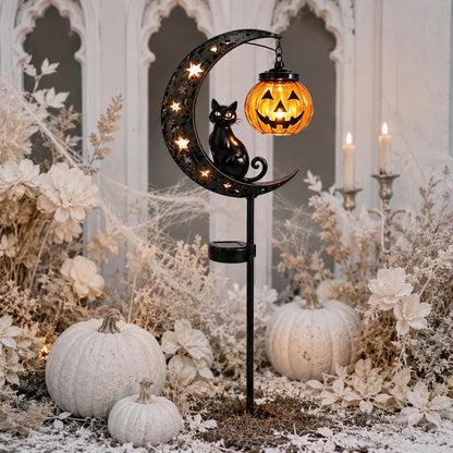 Black cat pumpkin moon garden stake light in elegant white pumpkin flower bed