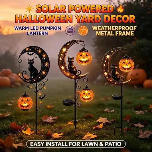 Solar powered black cat pumpkin moon garden stake lights in yard with warm LED glow