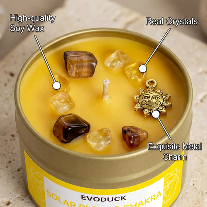 Solar plexus chakra candle with crystal and sun charm close-up