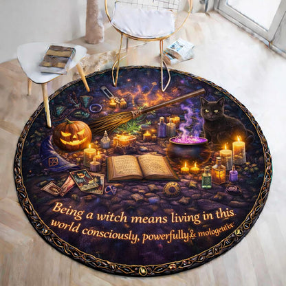 Round black witchy rug with a black cat, pumpkin, broom, candles, and "Being a witch means living in this world consciously, powerfully & unapologetically" text.