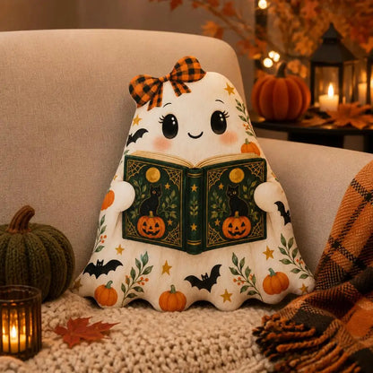 Styled room view: decorative plush pillow featuring ghost book-lover artwork