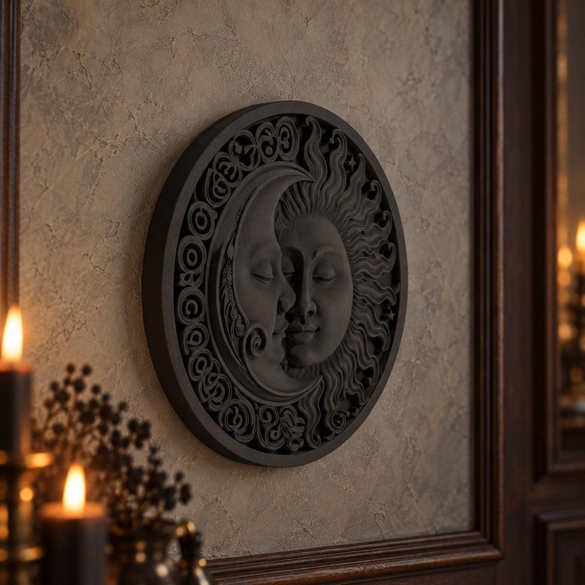 Side view of black sun and moon plaque against warm grey gothic plaster