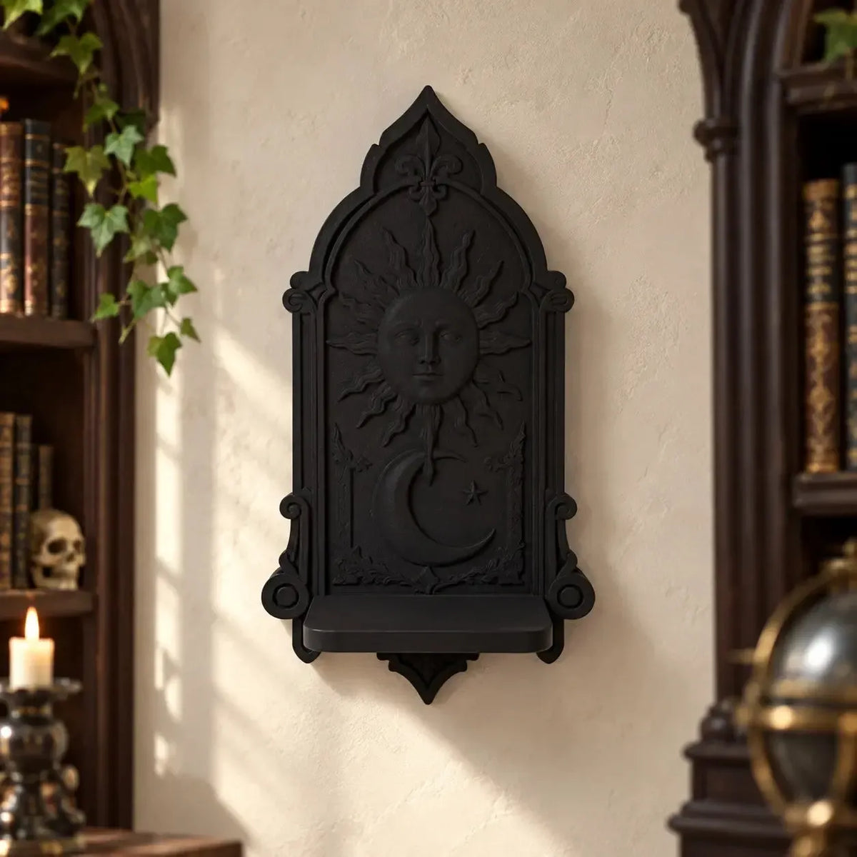 Front view of sun face and crescent above a ledge