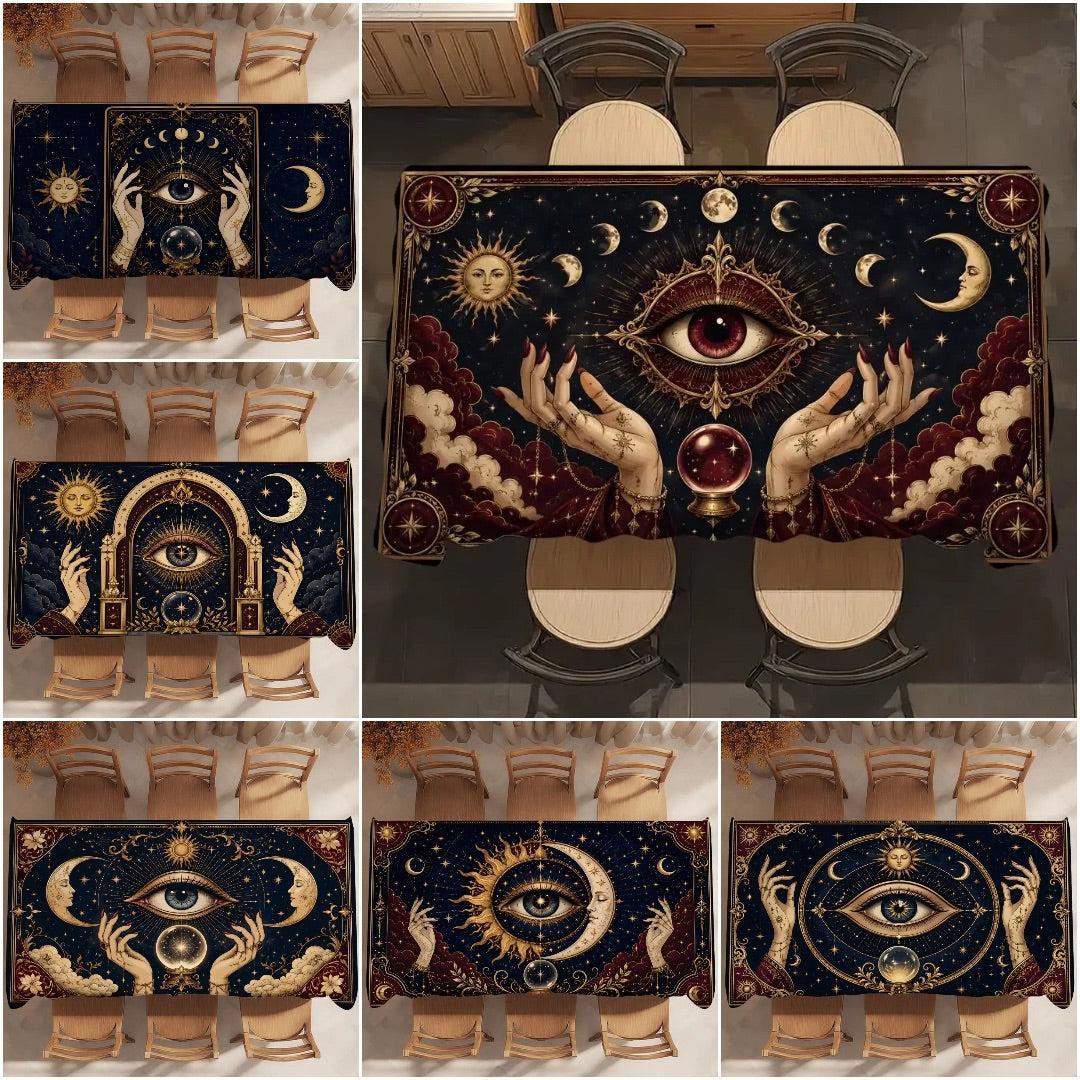 A collage showing a rectangular tablecloth with an elaborate celestial and mystical design. The main large panel on the right shows the tablecloth styled on a dining table with chairs, while the smaller panels on the left show alternate design views of the same tablecloth pattern against a neutral background.