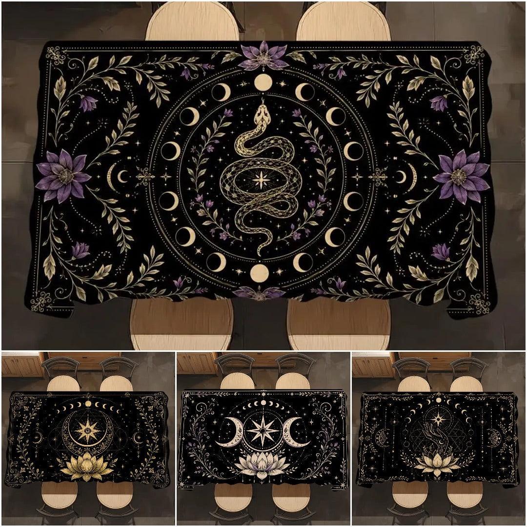 A black tablecloth with a mystical occult design featuring a central snake, moon phases, stars, and purple flowers, shown in a main large view and three smaller alternate design views below.