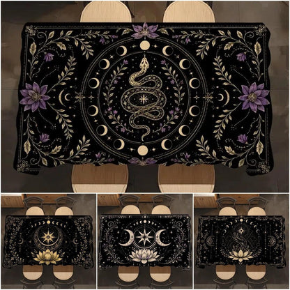 A black tablecloth with a mystical occult design featuring a central snake, moon phases, stars, and purple flowers, shown in a main large view and three smaller alternate design views below.