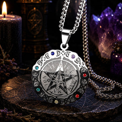 Silver pentacle pendant necklace with colorful stones on a dark background