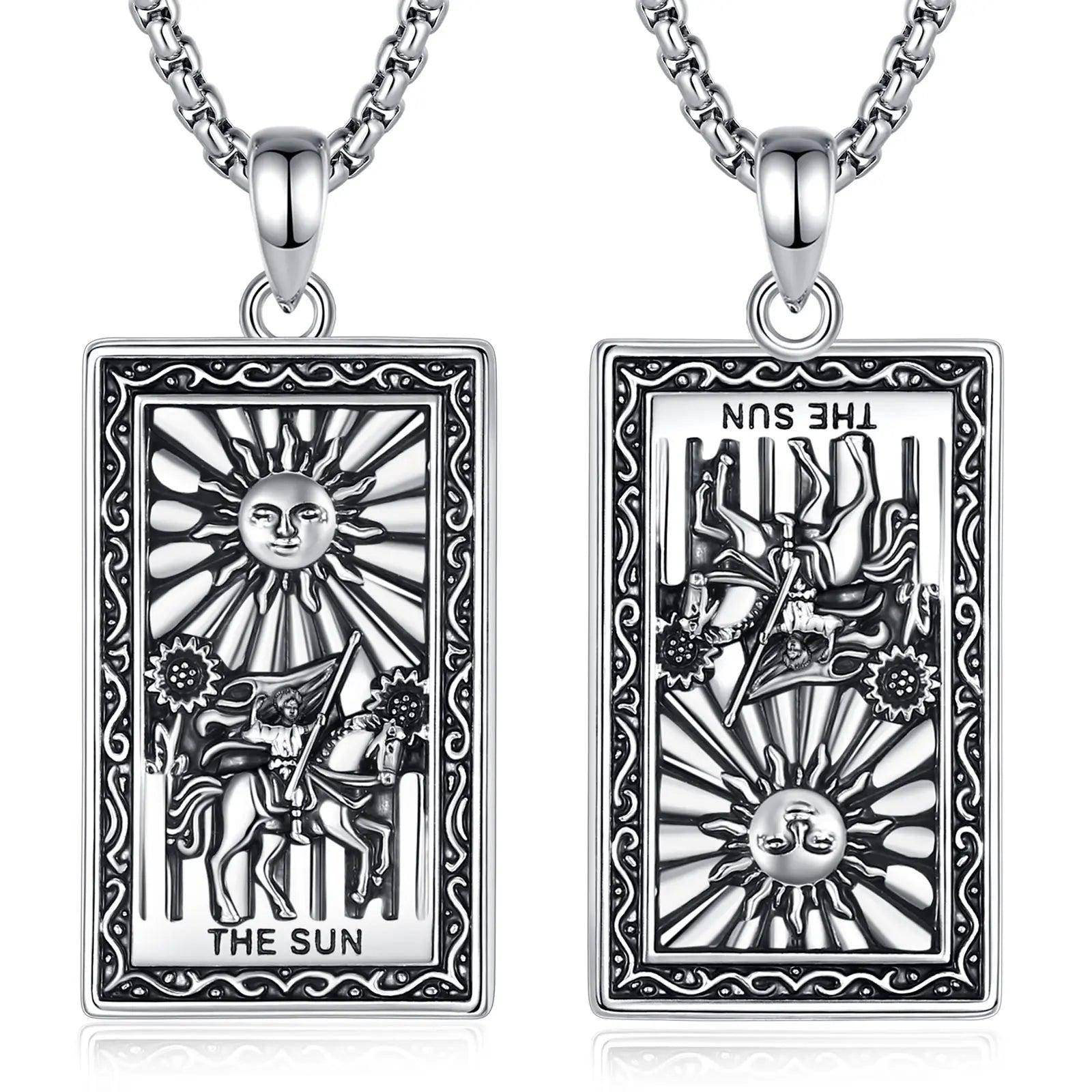 Silver "The Sun" Major Arcana Tarot card necklace, showing upright and reversed designs.