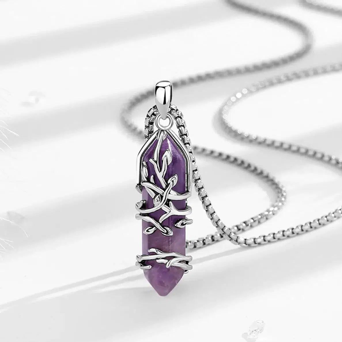 Stunning Tree of Life natural amethyst pendant necklace with silver-plated copper, symbolizing wisdom and spirituality.